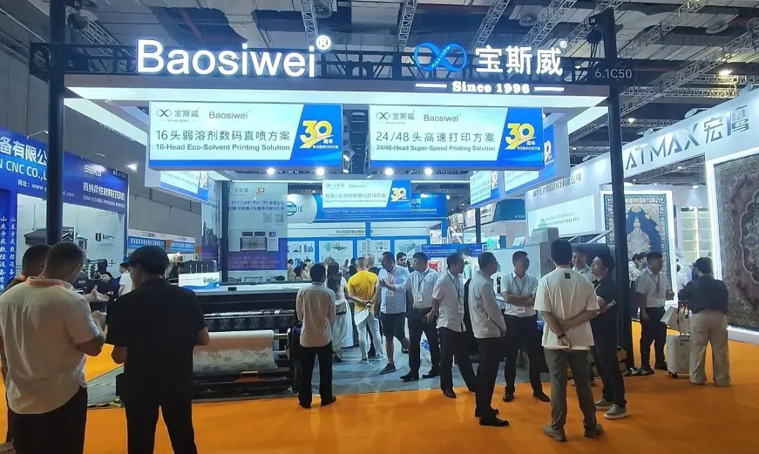 Busy Baoswei booth scene at Shanghai flooring expo featuring 16-head eco-solvent direct printing and 24-48 head high-speed solutions simultaneously