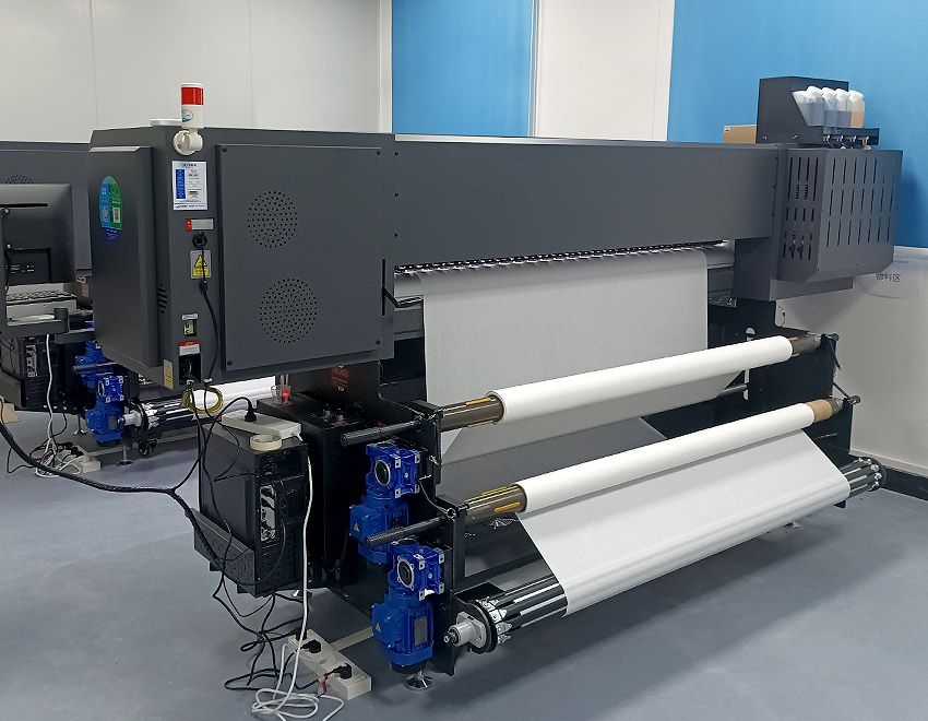 Backside working scene of Baosiwei printer with dual pneumatic shafts ensuring balanced roll feeding
