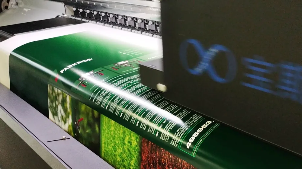 Baosiwei digital printing unit outputting green PARKSIDE brand packaging pattern on paperboard — Epson i3200-A1 printheads no pre-coating required for TV color box production